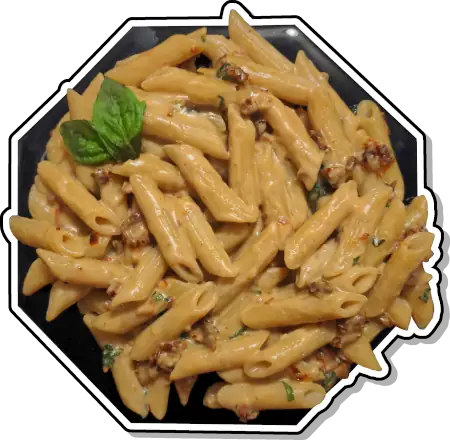 Penne pasta coated in in a creamy mozzarella sauce with sun-dried tomatoes and fresh basil.